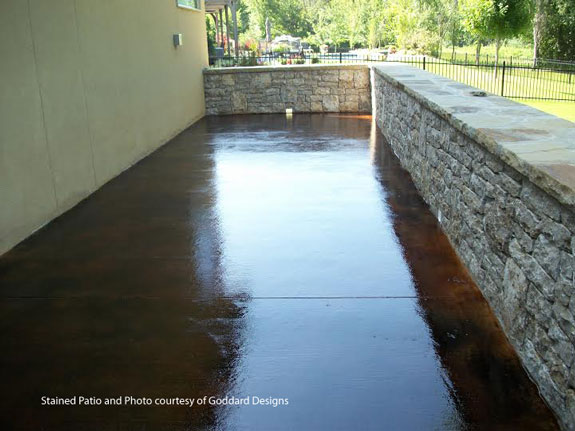 stained concrete patio by Goddard Designs