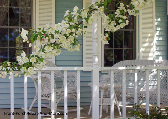 front porch in spring time with flowering tree