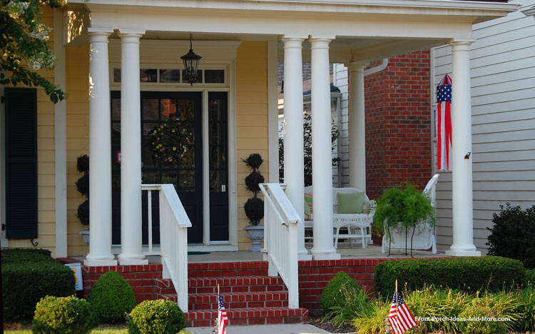 round tapered columns on wrap around porch