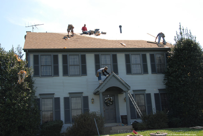 modest two-story home under renovation 