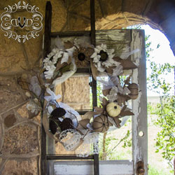 unique autumn wreath design on vintage door