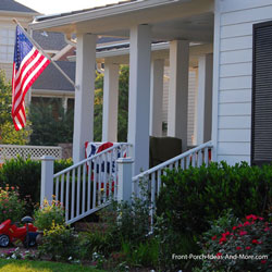 porch decorated for st patricks day with burlap pillows