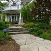 stone walkway leading to front porch