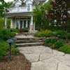stone walkway leading to front porch