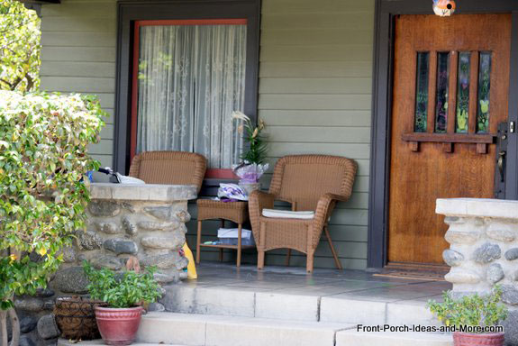 craftsman style wooden front door on porch