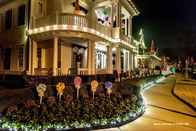 Christmas lights on a row of homes make an amazing outdoor Christmas light display