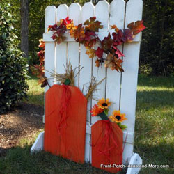 autumn craft with picket fence and pumpkins