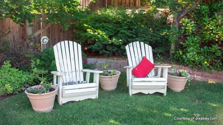 Be sure to include some comfortable chairs for lounging in your backyard