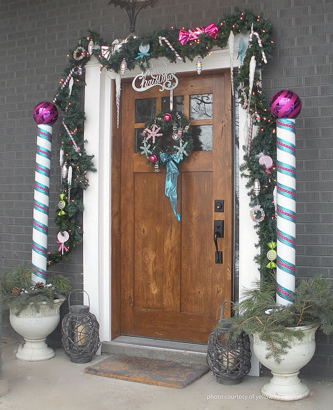 blue and white candy canes beside front door
