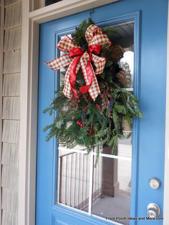 Our Christmas wreath simplyl made with fresh greenery and elements for the woods