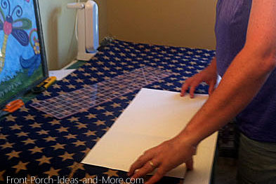 Cutting the blue burlap to size