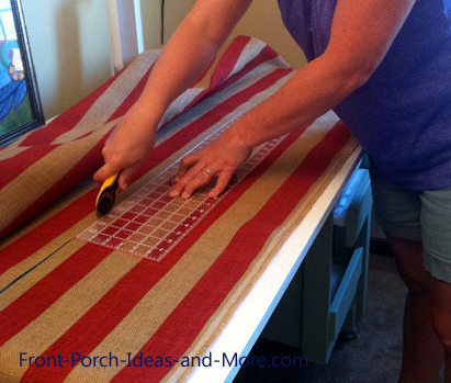 Cutting the red burlap to size