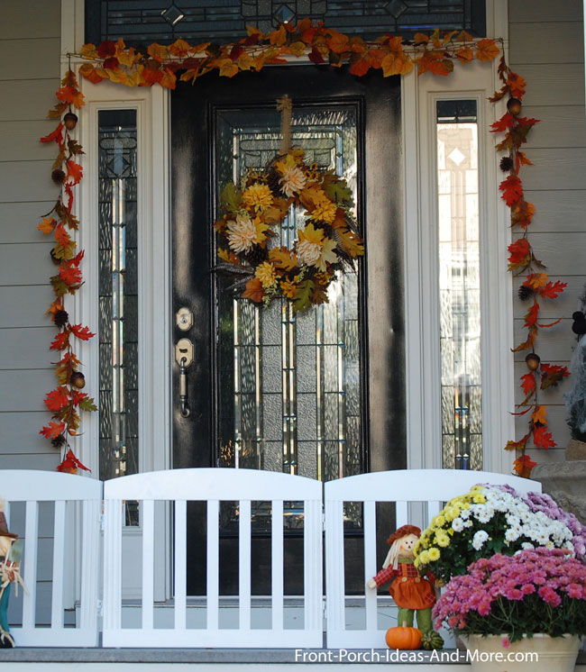 autumn garland over front door on front porch