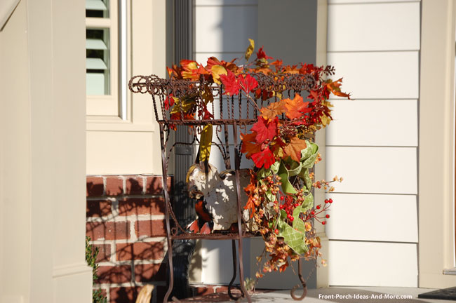 fall garland on table on front porch