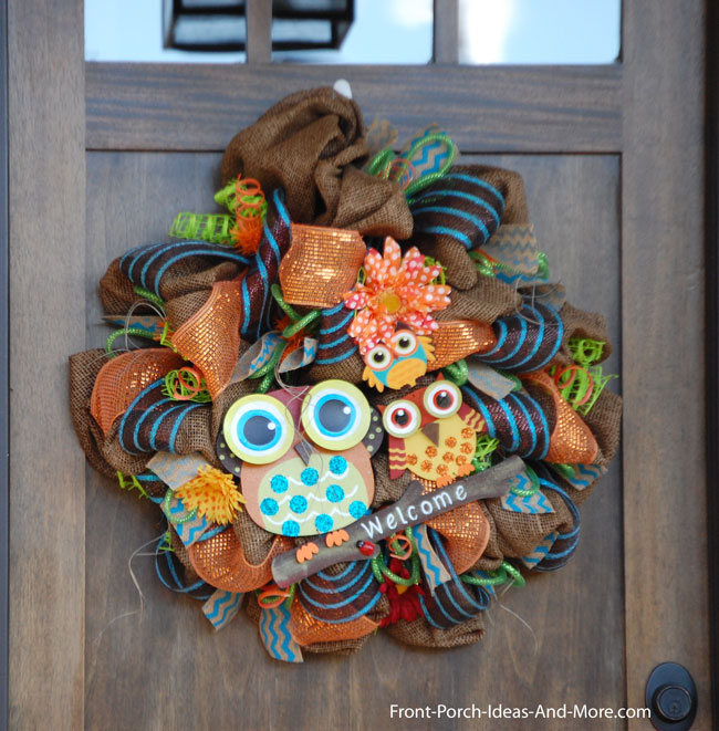 fall whimsical wreath on front door