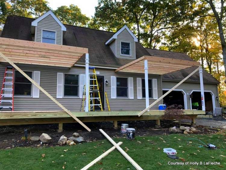 Holly's new porch is being constructed with two shed roofs on either side