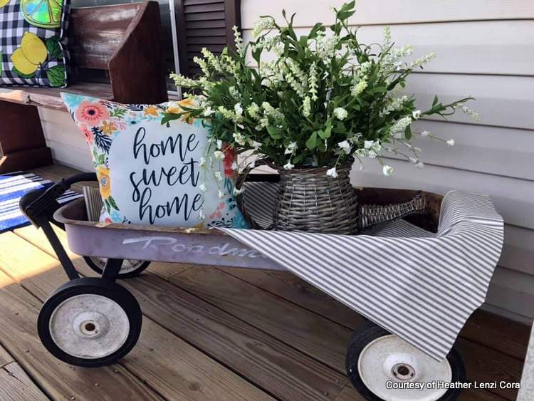 Heather's vintage wagon on her mobile home porch with flowers