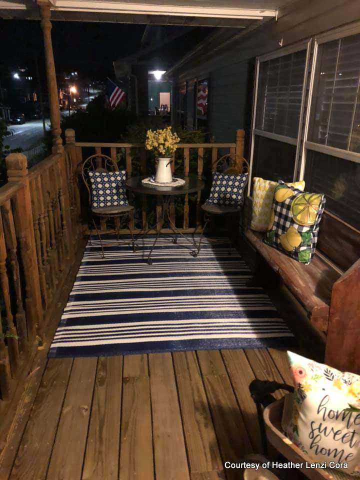 Heather's mobile home front porch at night - decorated so pretty!