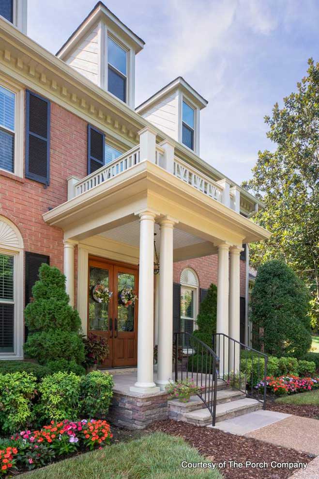 porch rocking chair with pretty pillow
