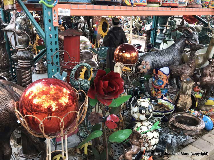 Yard Art Emporium - shiny orange gazing-balls
