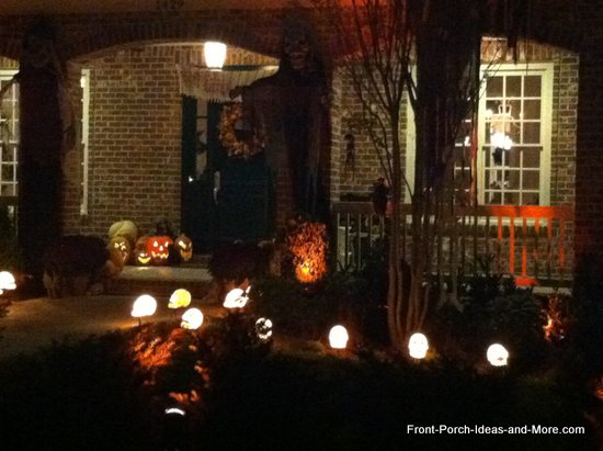 Ghoulish monsters on either side of the porch