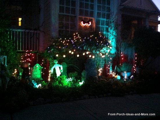 Use the landscaping around your front porch to fill with goblins, headstones and twinkle lights