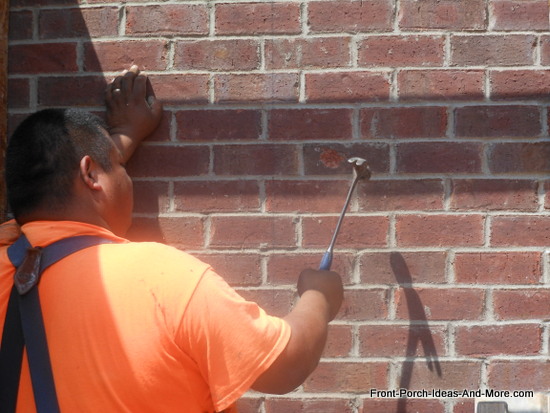 knocking out brick to accept concrete