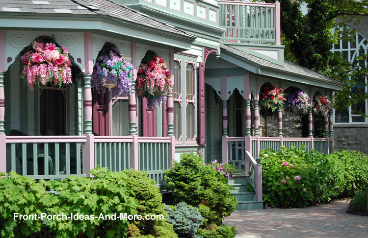 hanging baskets of flowers on front porch