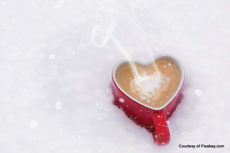 heart-shaped cup in beautiful snow