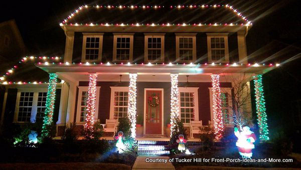 front porch columns wrapped in varying colored lights
