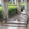 black metal intricately designed metal porch swing