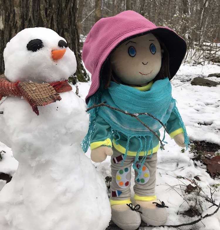 Molly Jo Daisy with snowman