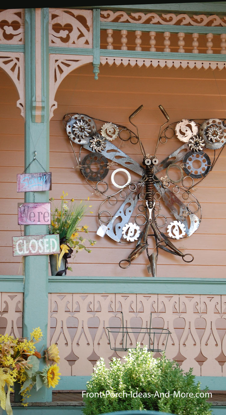 outdoor butterfly artwork on front porch