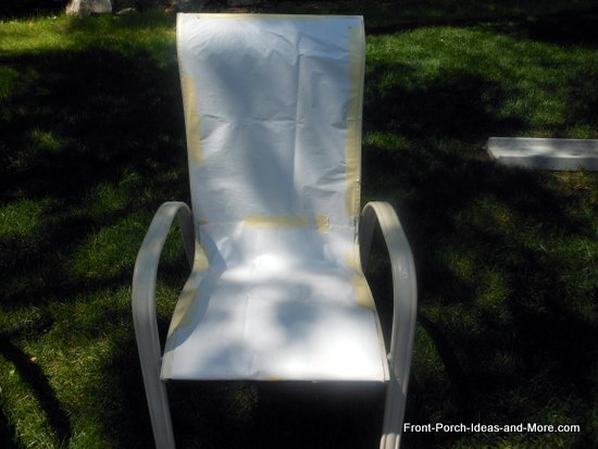 chairs masked in the areas I don't want to paint