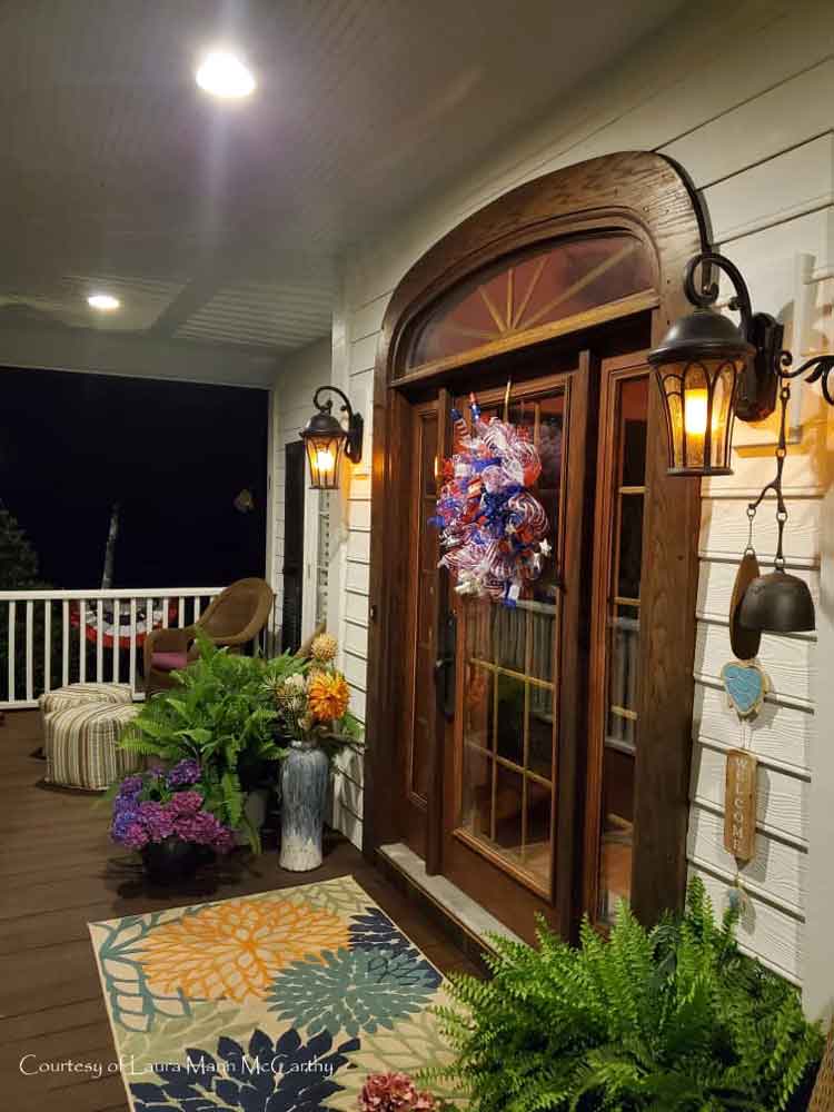 Laura's beautiful patriotic porch in the evening