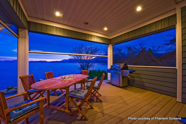 gorgeous porch at dusk with retractable screens