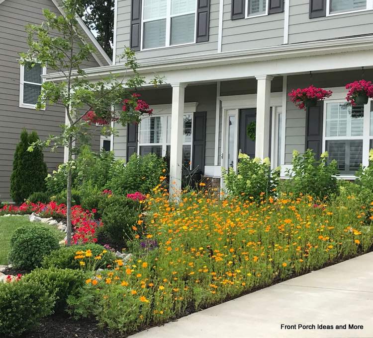 beautiful porch with pretty landscaping