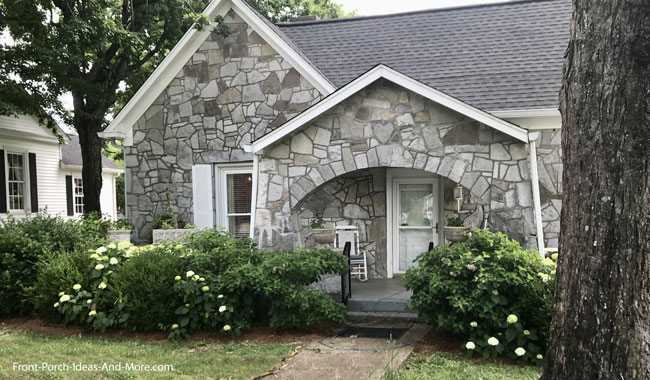 porch with a stone facade