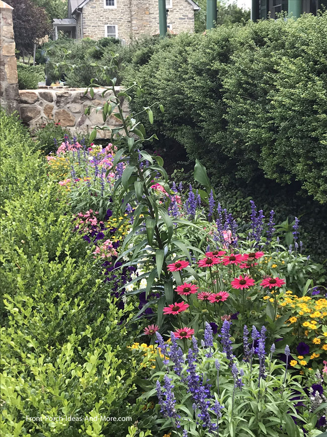 cottage garden landscaping in front of porch