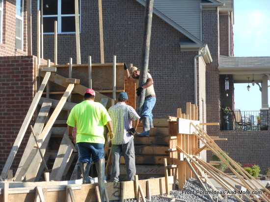 pouring concrete in lower porch step section