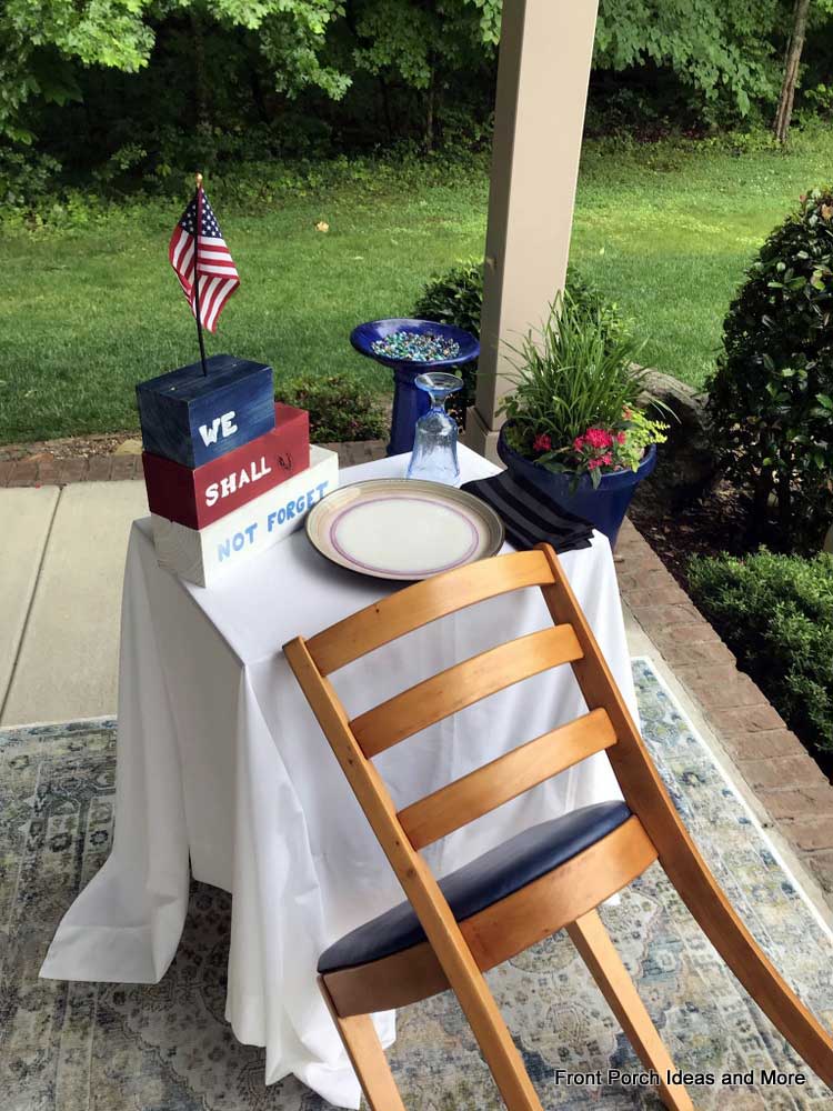 Our front door for Memorial Day with a wooden vintage flag