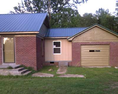 partial ranch home and garage