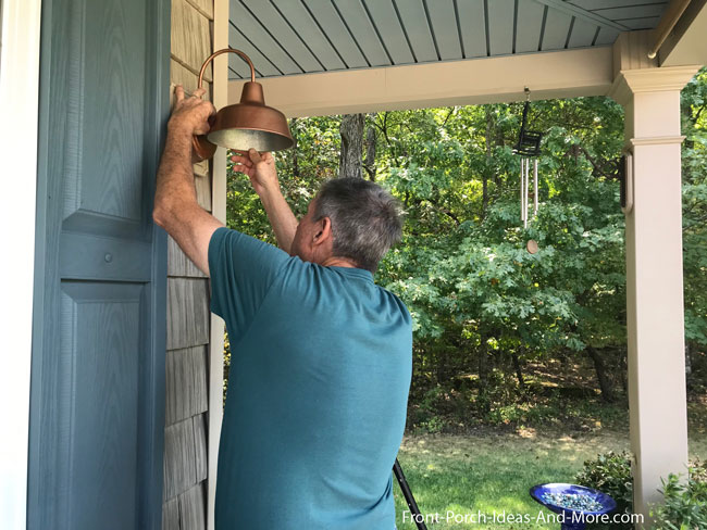 porch light spray painted with copper paint