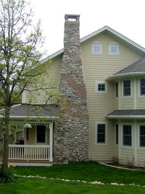 Craftsman farm house side view on porch