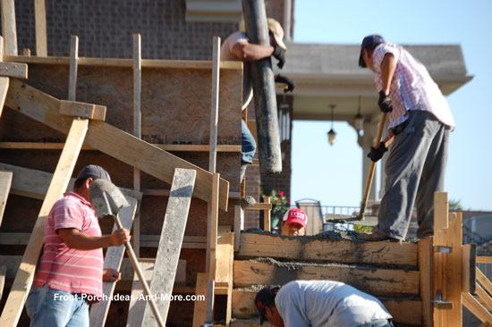 spreading concrete in form
