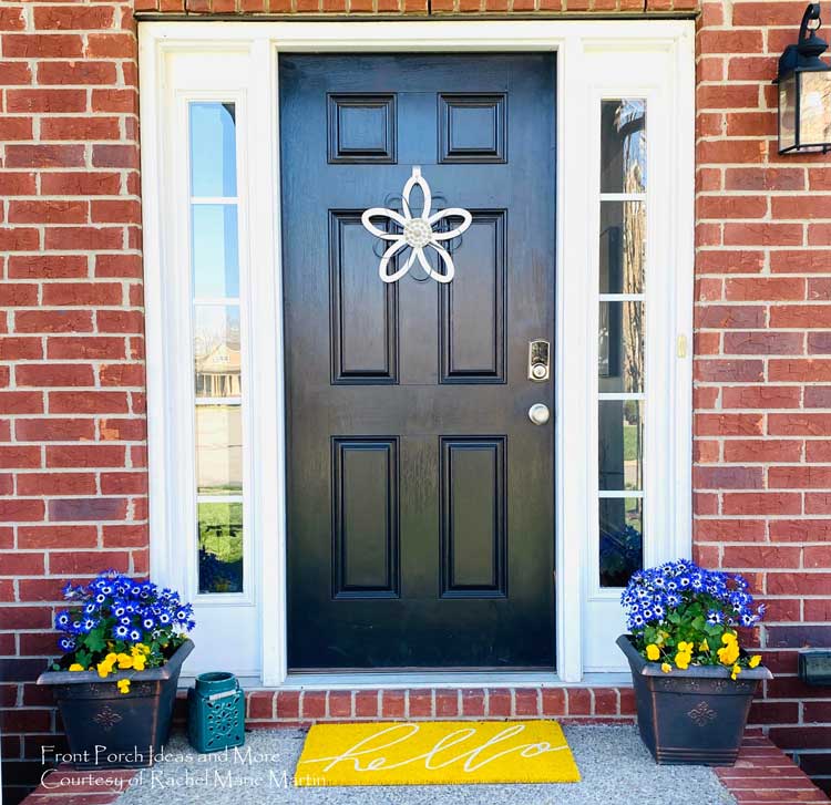 cheerful yellow door mat and gorgeous flowers for spring