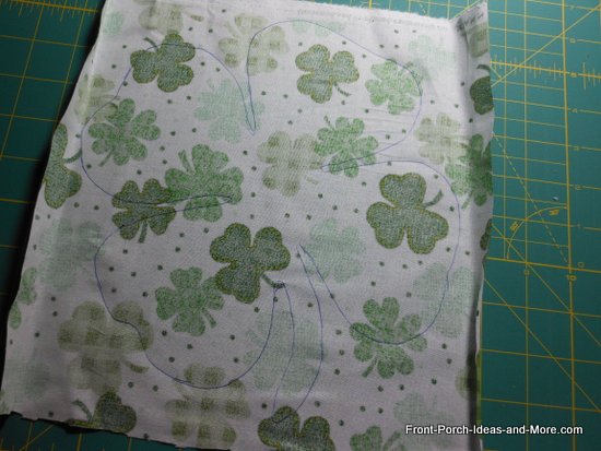 pillow toppers - trace the shamrock onto the back side of your shamrock fabric swatch
