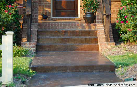 stained concrete walkway to front porch
