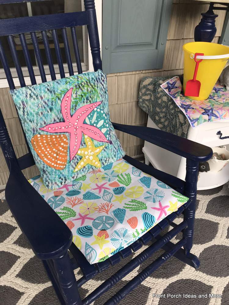 Summery beach cushions and shells painted on pillows