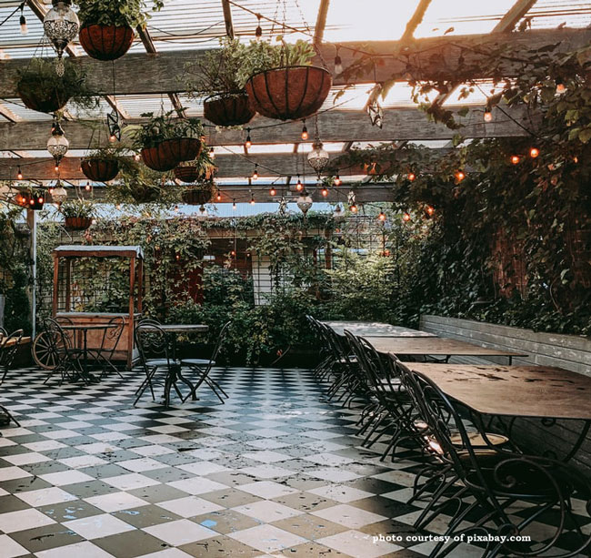 tiled outdoor patio with tables